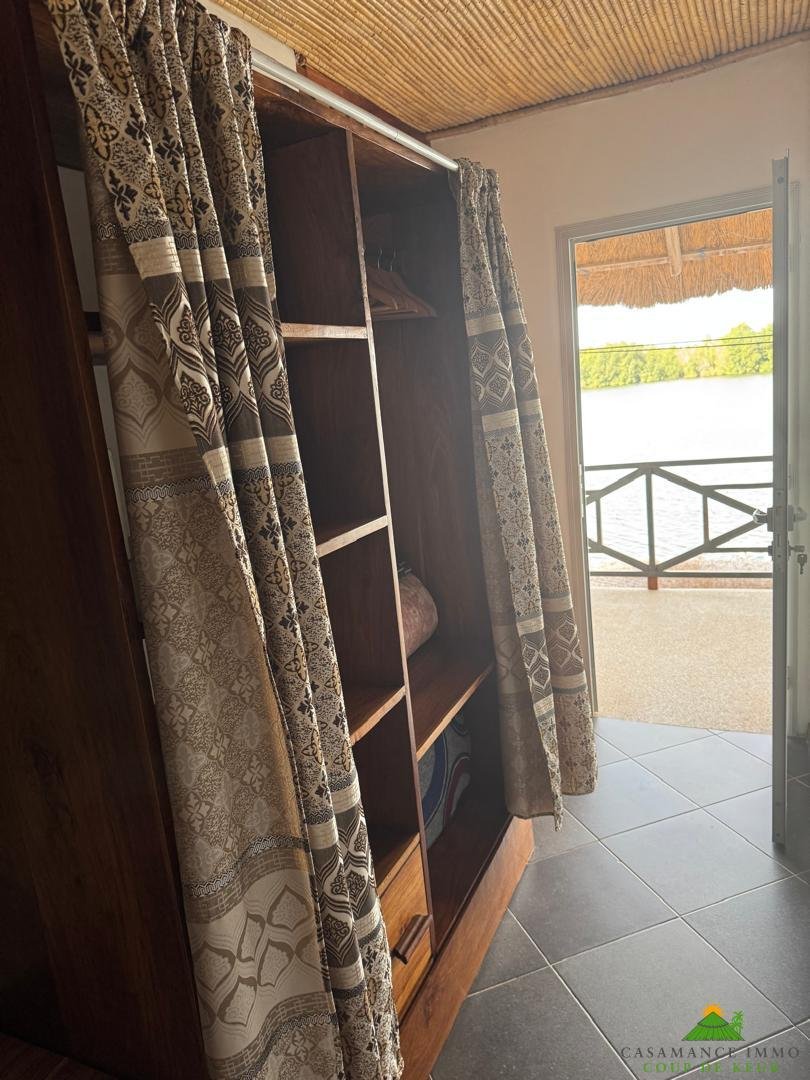 WhatsApp Image 2026-10-23 at 10.58.25 (1) Nouveau, insolite dans le secteur du Cap Skirring :une maison (2 chambres) sur Pilotis surplombant les bolongs